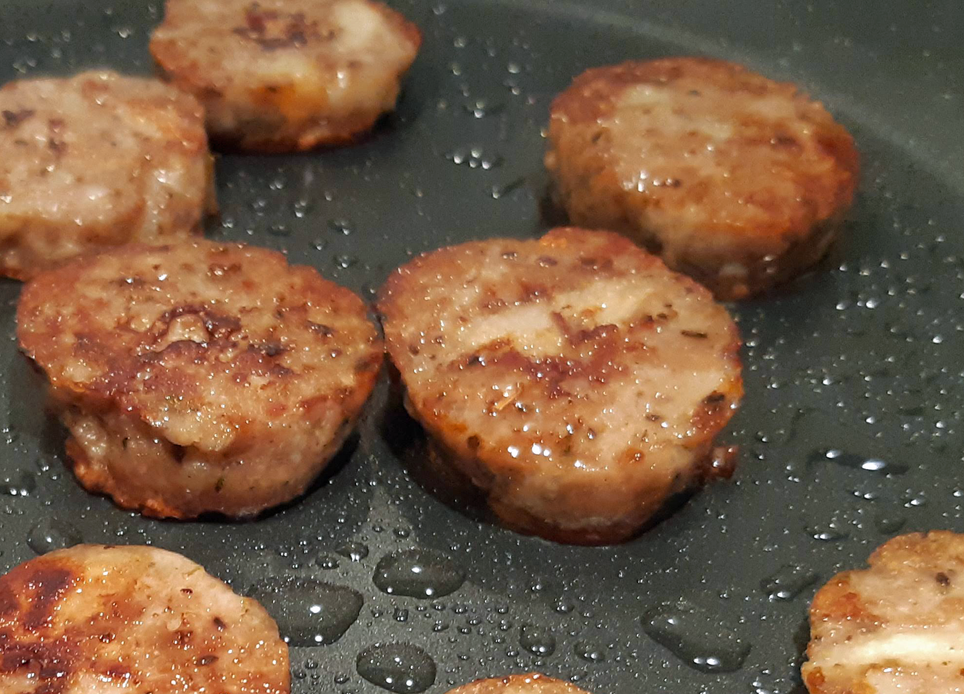 Hogs pudding frying in pan
